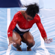 Biles nearly comes down to her knees after vault.